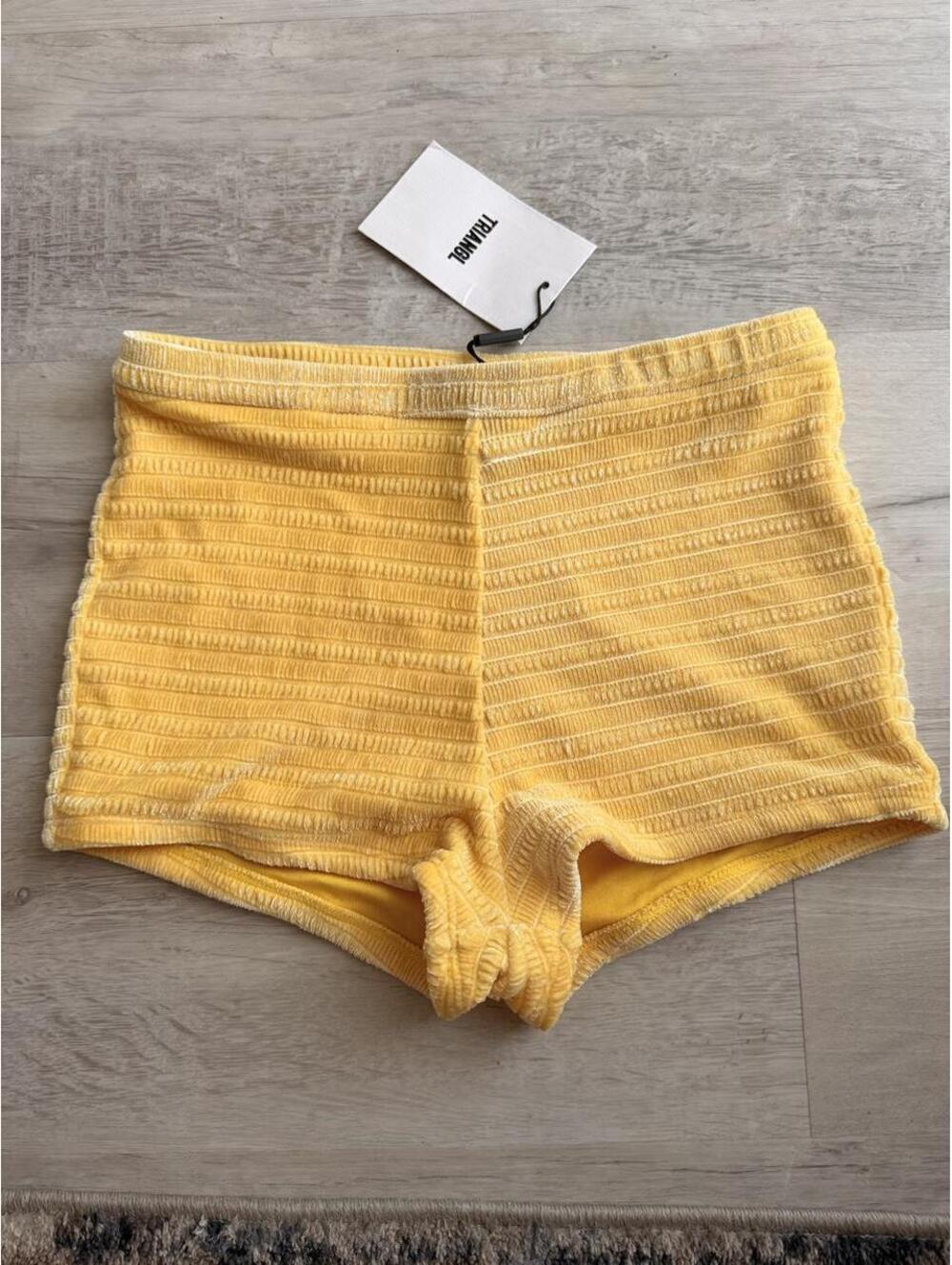 Triangl yellow shorts with horizontal ribbed texture